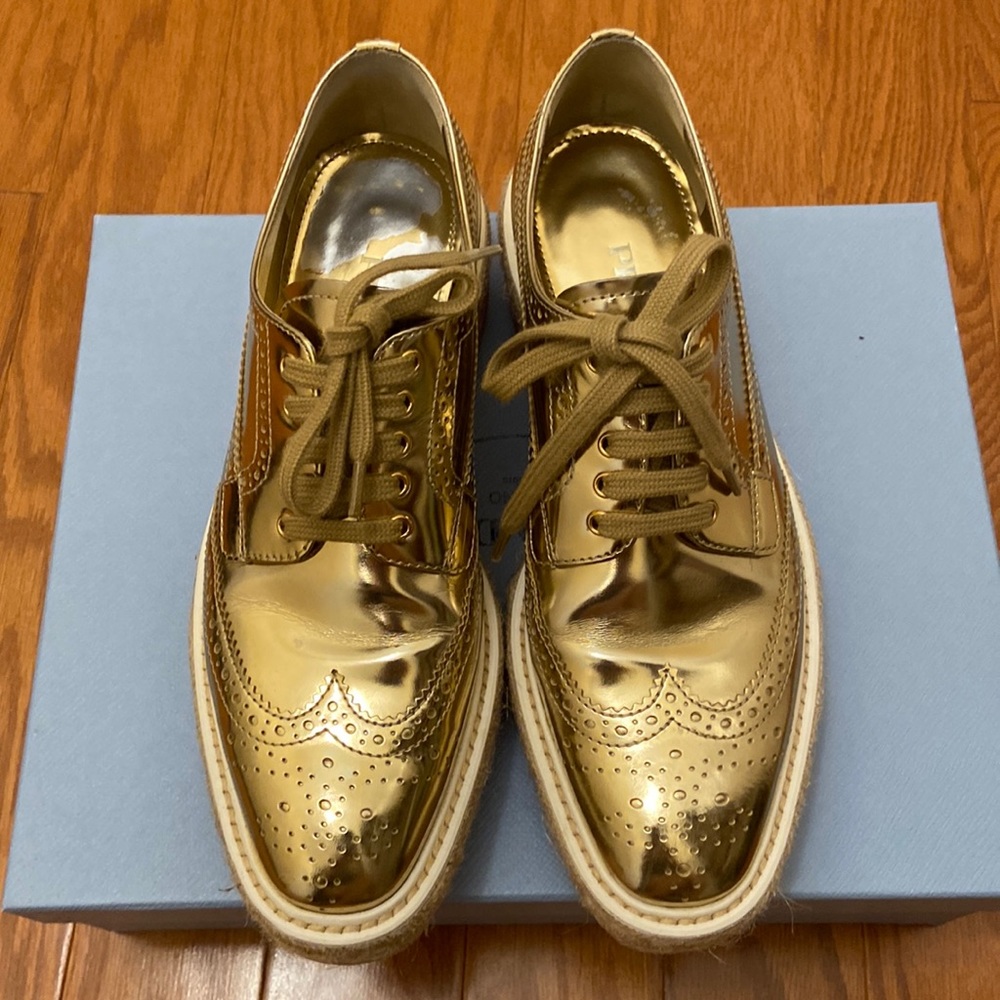 PRADA Size 38. Gold Leather Perforated Wingtip Lace Up Shoes